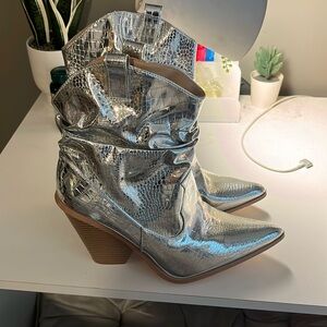 Cowgirl boots. Never worn.